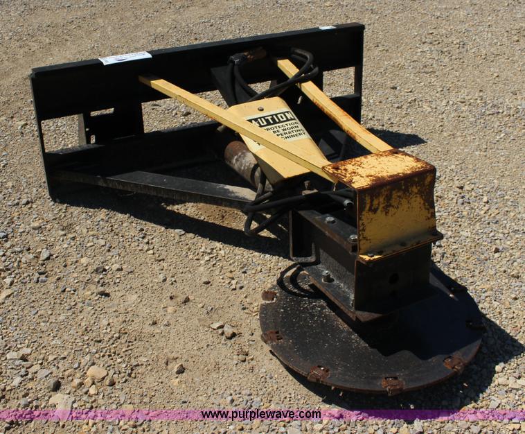 Longford tree saw skid steer attachment in Abilene, KS Item K1065 sold Purple Wave