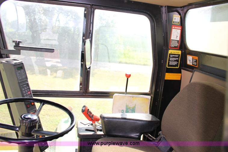 image for item K1080 1997 John Deere 7455 6R30 cotton stripper