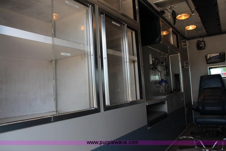 image for item J1140 1997 International 810 ambulance