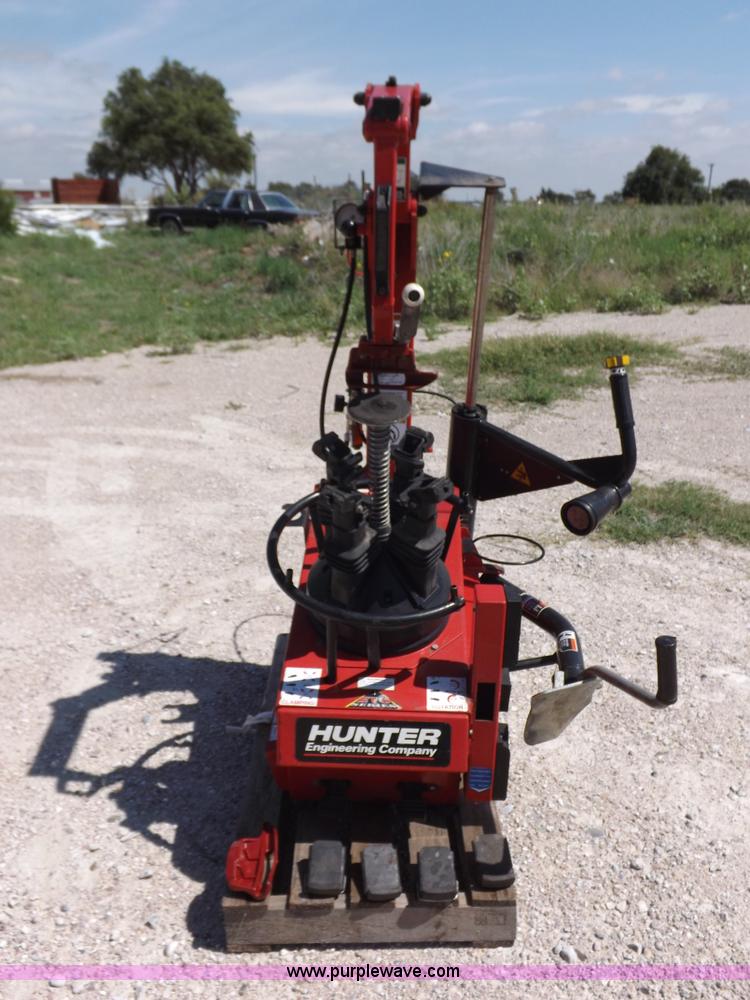 image for item J6877 Hunter rim clamp tire machine