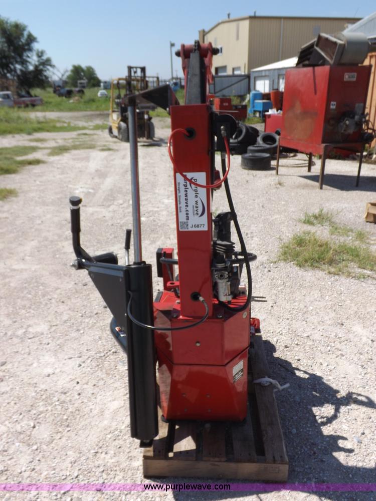 image for item J6877 Hunter rim clamp tire machine