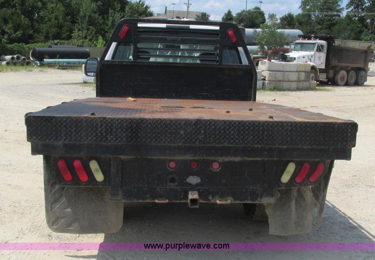 image for item J8577 2003 Ford F350 Super Duty XLT SuperCab flatbed truck