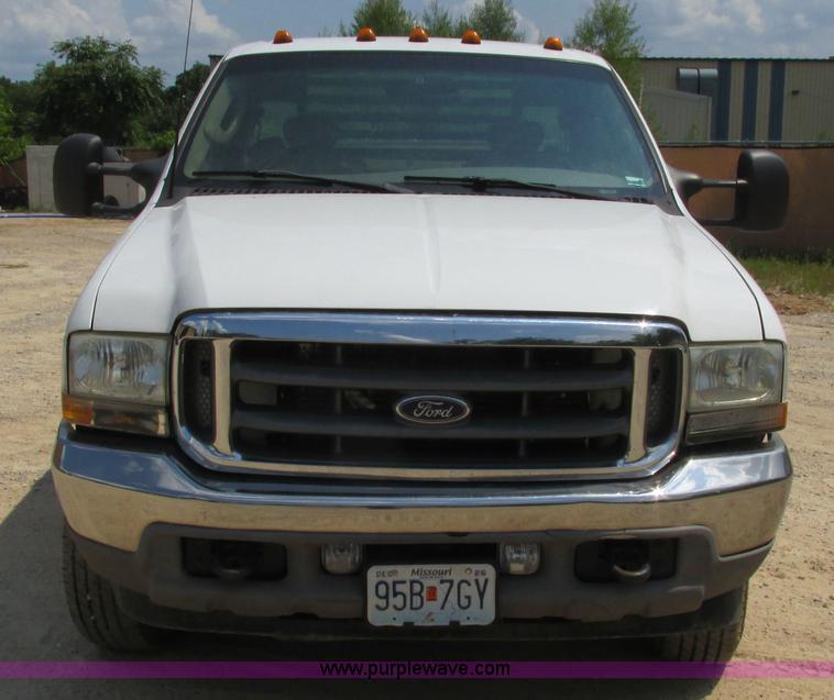 image for item J8577 2003 Ford F350 Super Duty XLT SuperCab flatbed truck