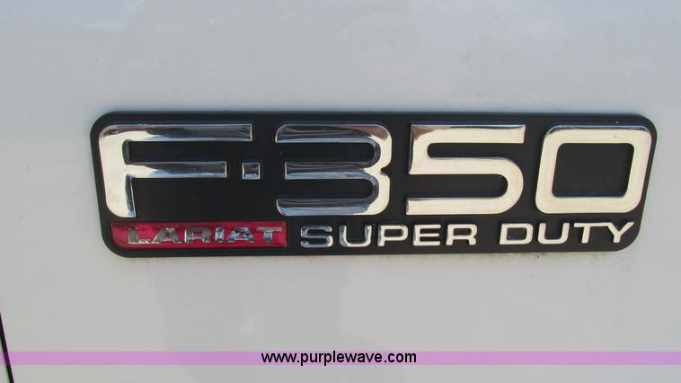 image for item J8577 2003 Ford F350 Super Duty XLT SuperCab flatbed truck