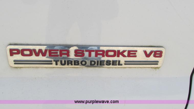 image for item J8577 2003 Ford F350 Super Duty XLT SuperCab flatbed truck