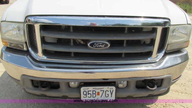 image for item J8577 2003 Ford F350 Super Duty XLT SuperCab flatbed truck