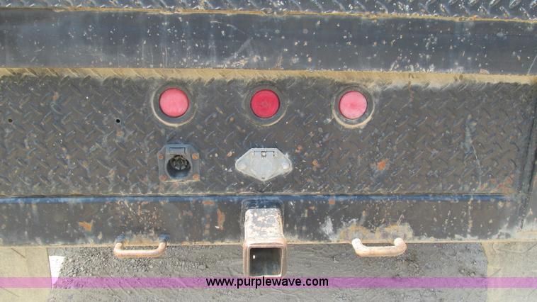 image for item J8577 2003 Ford F350 Super Duty XLT SuperCab flatbed truck