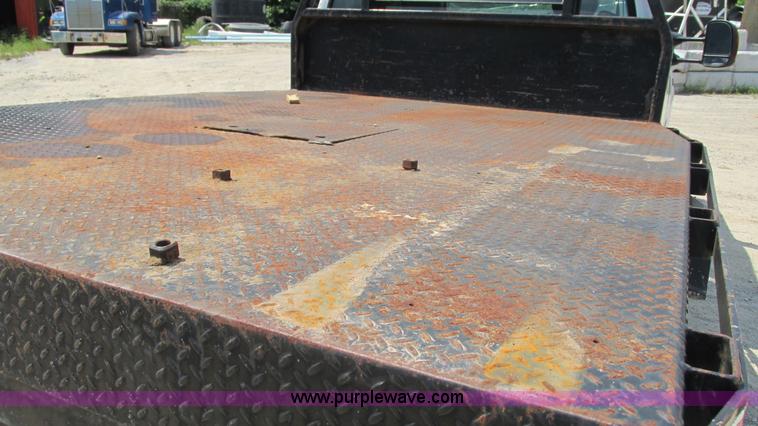 image for item J8577 2003 Ford F350 Super Duty XLT SuperCab flatbed truck