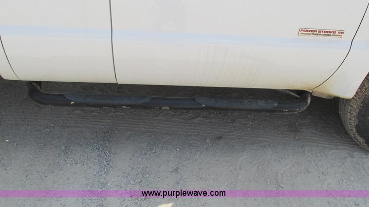 image for item J8577 2003 Ford F350 Super Duty XLT SuperCab flatbed truck