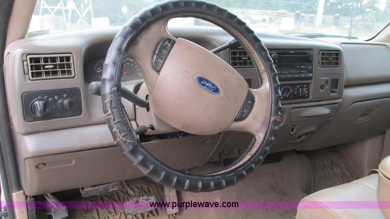 image for item J8577 2003 Ford F350 Super Duty XLT SuperCab flatbed truck