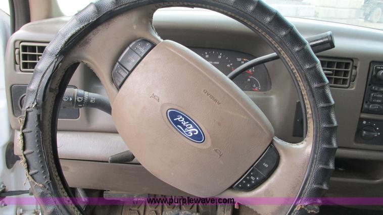 image for item J8577 2003 Ford F350 Super Duty XLT SuperCab flatbed truck