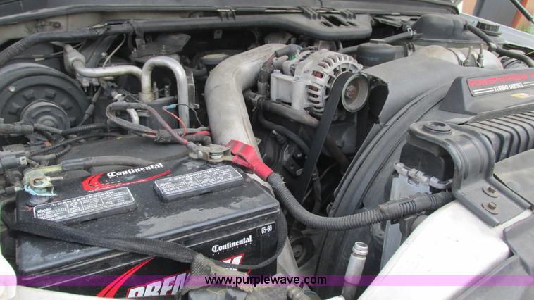 image for item J8577 2003 Ford F350 Super Duty XLT SuperCab flatbed truck