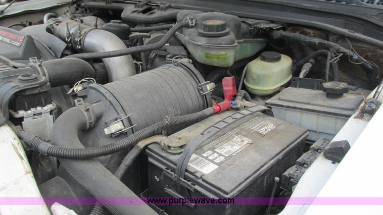 image for item J8577 2003 Ford F350 Super Duty XLT SuperCab flatbed truck