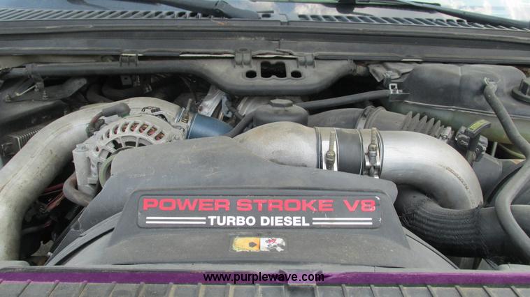 image for item J8577 2003 Ford F350 Super Duty XLT SuperCab flatbed truck