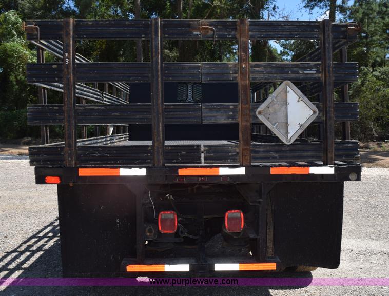 image for item L5779 1997 Freightliner FL70 flatbed truck