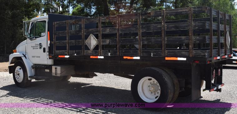 image for item L5779 1997 Freightliner FL70 flatbed truck