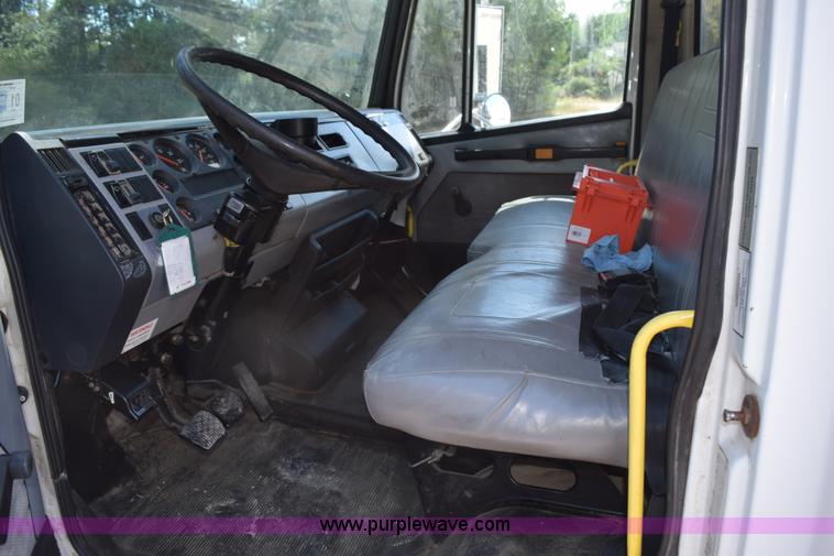 image for item L5779 1997 Freightliner FL70 flatbed truck