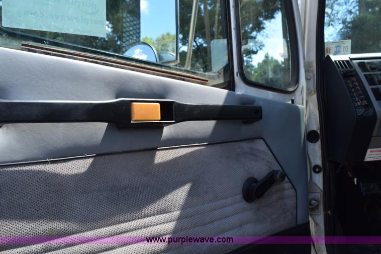 image for item L5779 1997 Freightliner FL70 flatbed truck