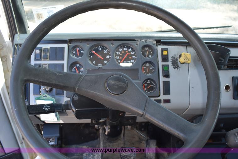 image for item L5779 1997 Freightliner FL70 flatbed truck