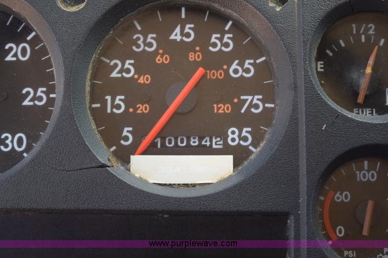 image for item L5779 1997 Freightliner FL70 flatbed truck