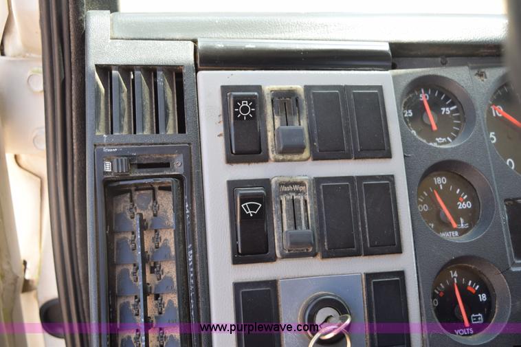 image for item L5779 1997 Freightliner FL70 flatbed truck