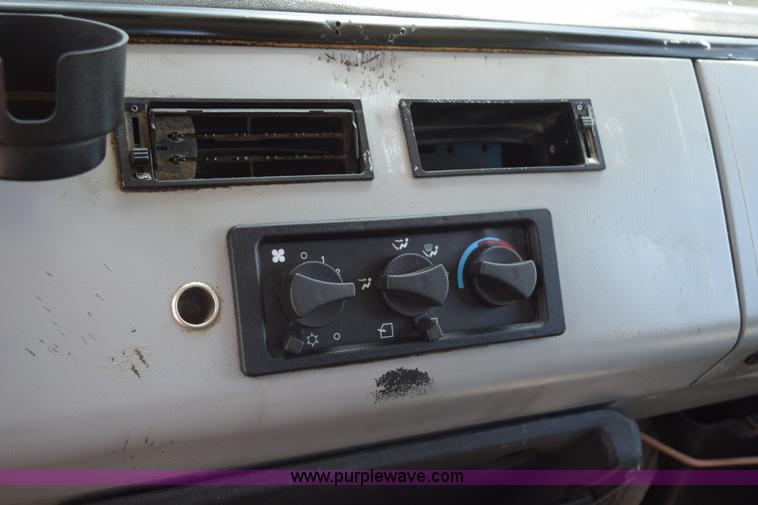 image for item L5779 1997 Freightliner FL70 flatbed truck