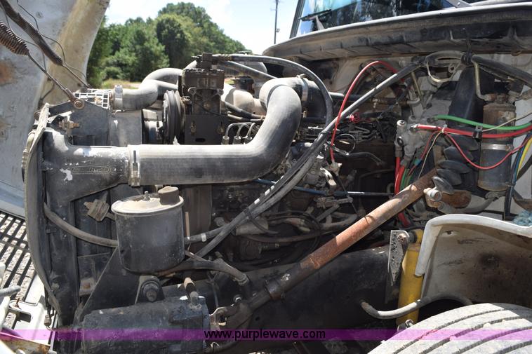 image for item L5779 1997 Freightliner FL70 flatbed truck