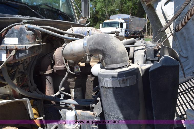 image for item L5779 1997 Freightliner FL70 flatbed truck