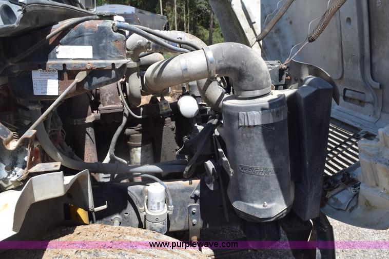 image for item L5779 1997 Freightliner FL70 flatbed truck