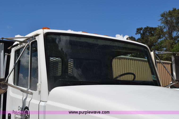 image for item L5779 1997 Freightliner FL70 flatbed truck