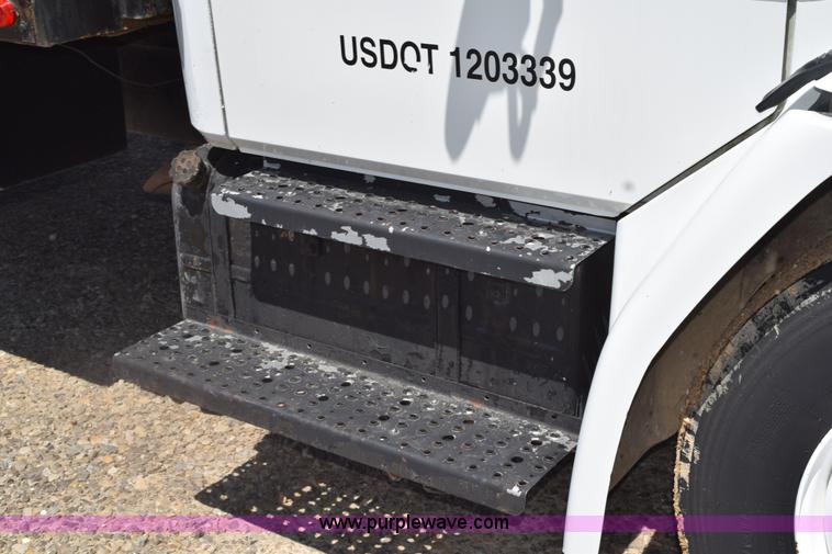 image for item L5779 1997 Freightliner FL70 flatbed truck