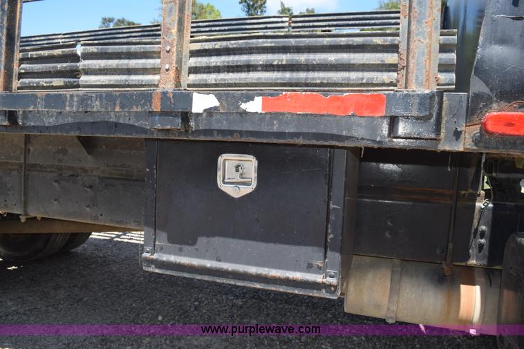 image for item L5779 1997 Freightliner FL70 flatbed truck