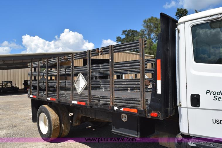 image for item L5779 1997 Freightliner FL70 flatbed truck