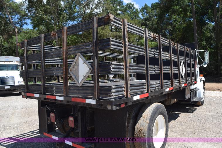 image for item L5779 1997 Freightliner FL70 flatbed truck