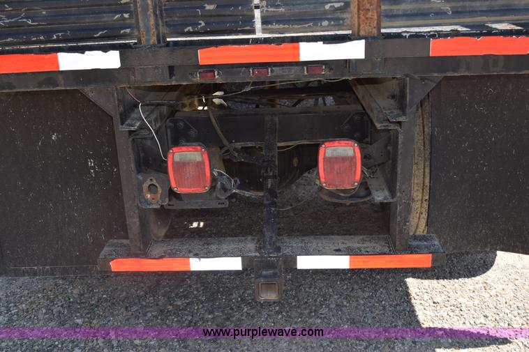 image for item L5779 1997 Freightliner FL70 flatbed truck