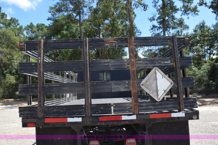 image for item L5779 1997 Freightliner FL70 flatbed truck