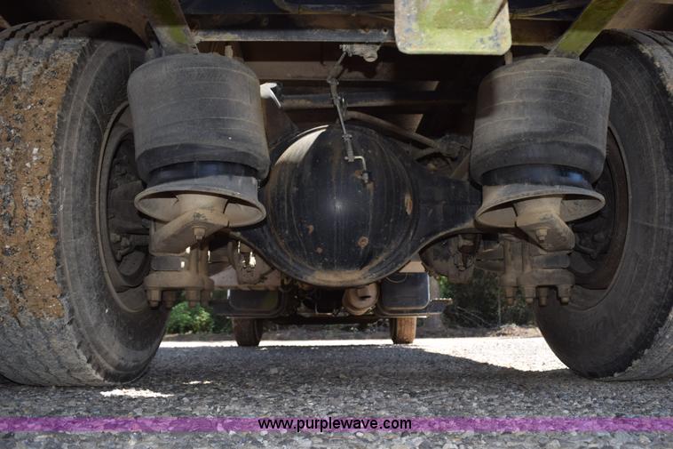 image for item L5779 1997 Freightliner FL70 flatbed truck