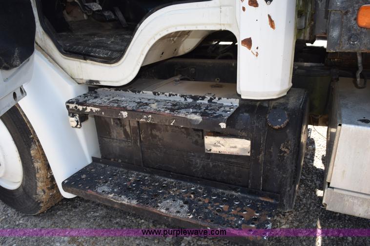 image for item L5779 1997 Freightliner FL70 flatbed truck