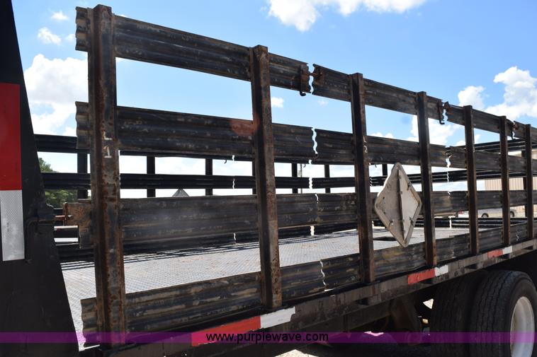 image for item L5779 1997 Freightliner FL70 flatbed truck