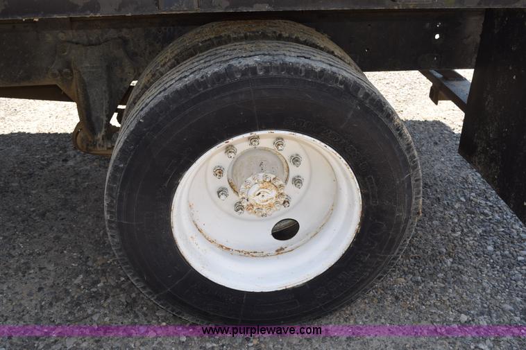 image for item L5779 1997 Freightliner FL70 flatbed truck