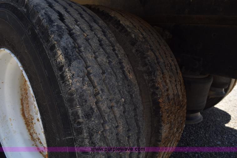 image for item L5779 1997 Freightliner FL70 flatbed truck