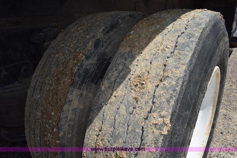 image for item L5779 1997 Freightliner FL70 flatbed truck