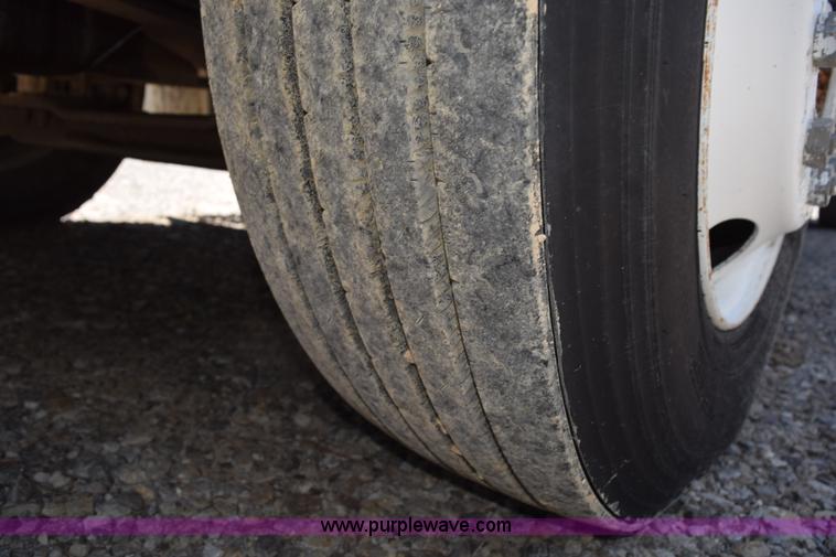 image for item L5779 1997 Freightliner FL70 flatbed truck