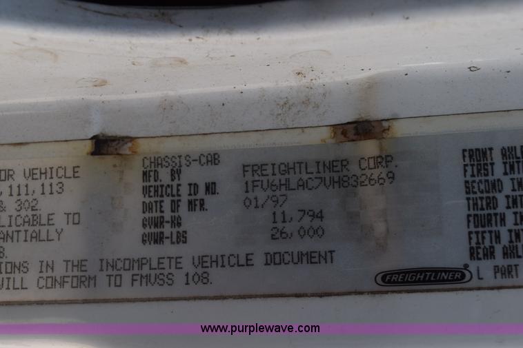 image for item L5779 1997 Freightliner FL70 flatbed truck