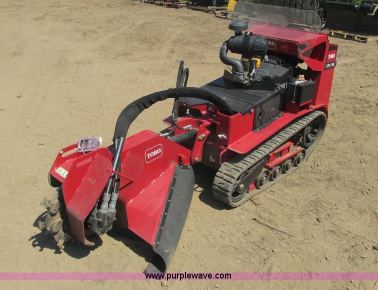 image for item K6546 2012 Toro STX38 walk behind stump grinder
