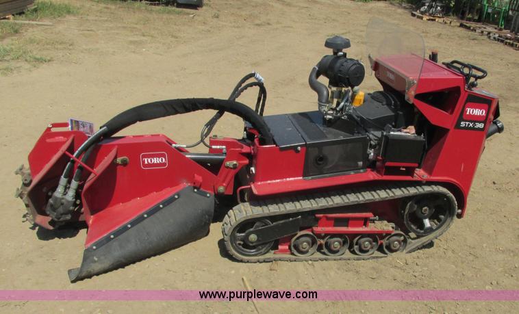 image for item K6546 2012 Toro STX38 walk behind stump grinder