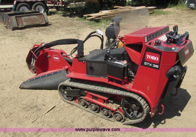 image for item K6546 2012 Toro STX38 walk behind stump grinder