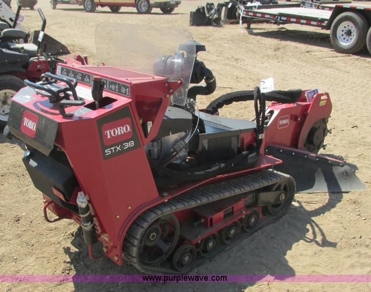 image for item K6546 2012 Toro STX38 walk behind stump grinder