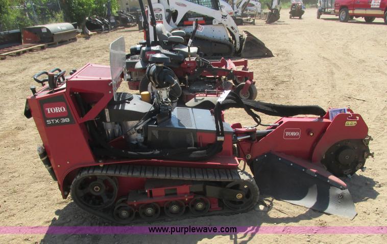 image for item K6546 2012 Toro STX38 walk behind stump grinder