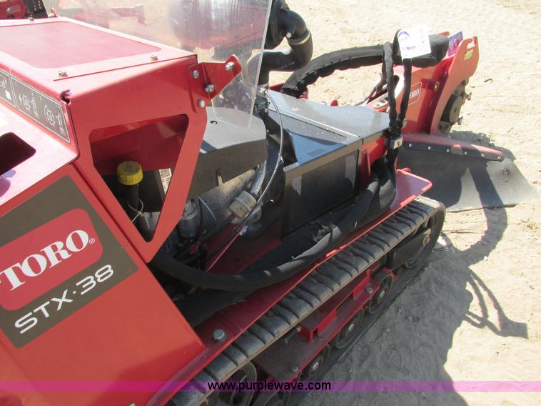 image for item K6546 2012 Toro STX38 walk behind stump grinder